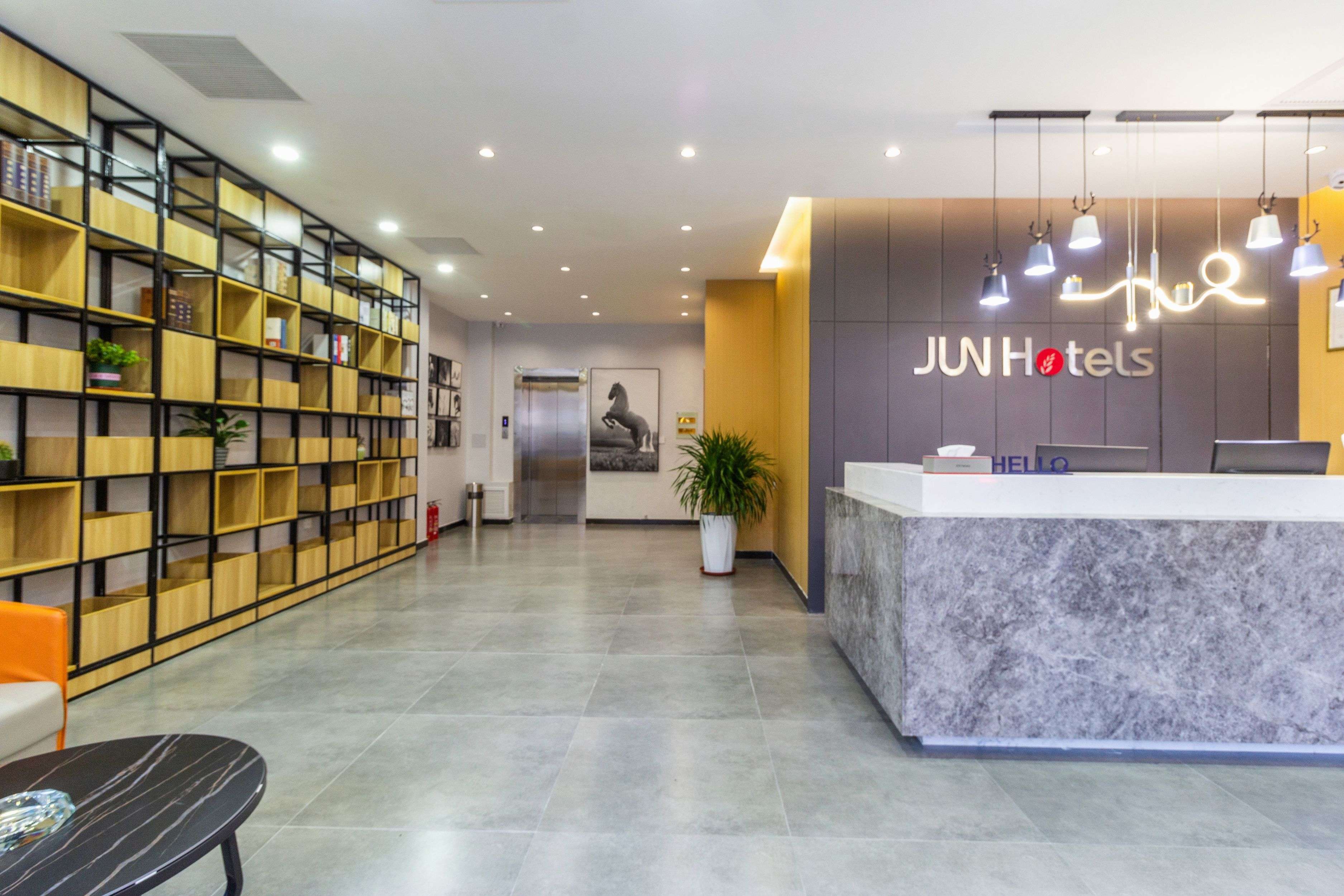 Chain hotel room offering standardized amenities and predictable setup