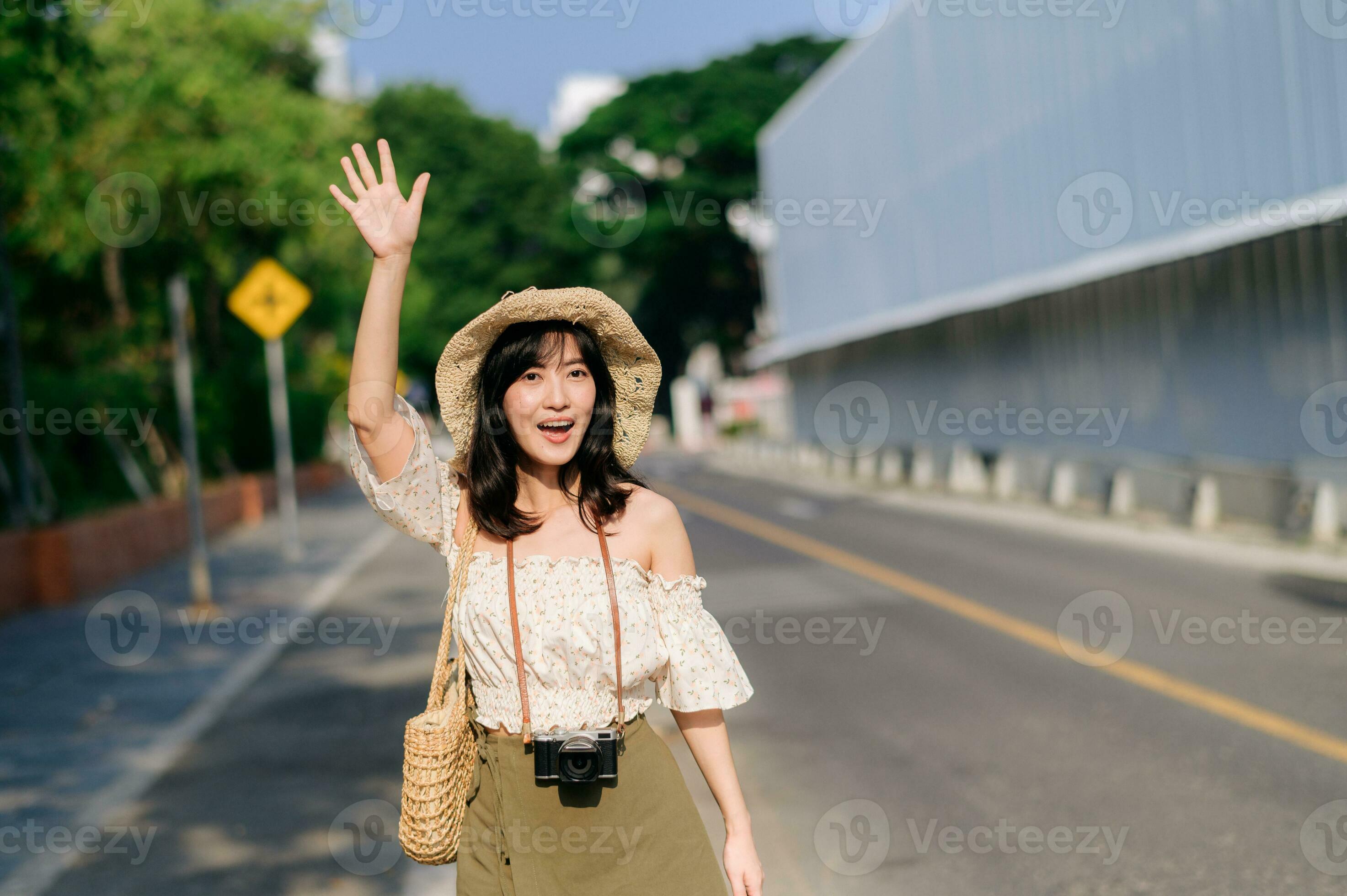 Traveler practicing ethical street photography in a city with a camera
