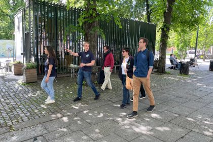 Guided walking tour through a historic city with a knowledgeable local guide