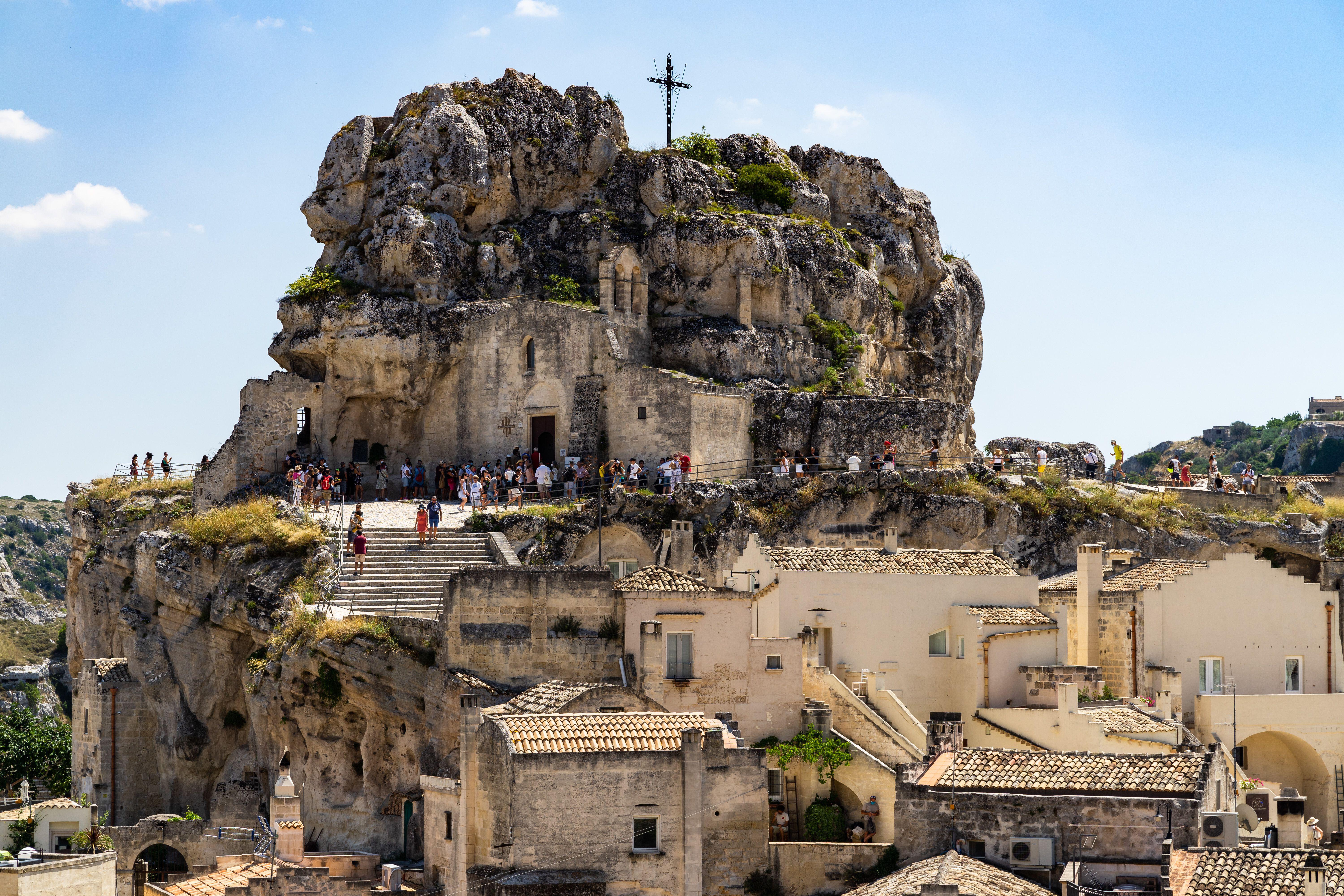 Visitors behaving respectfully at an active religious heritage site