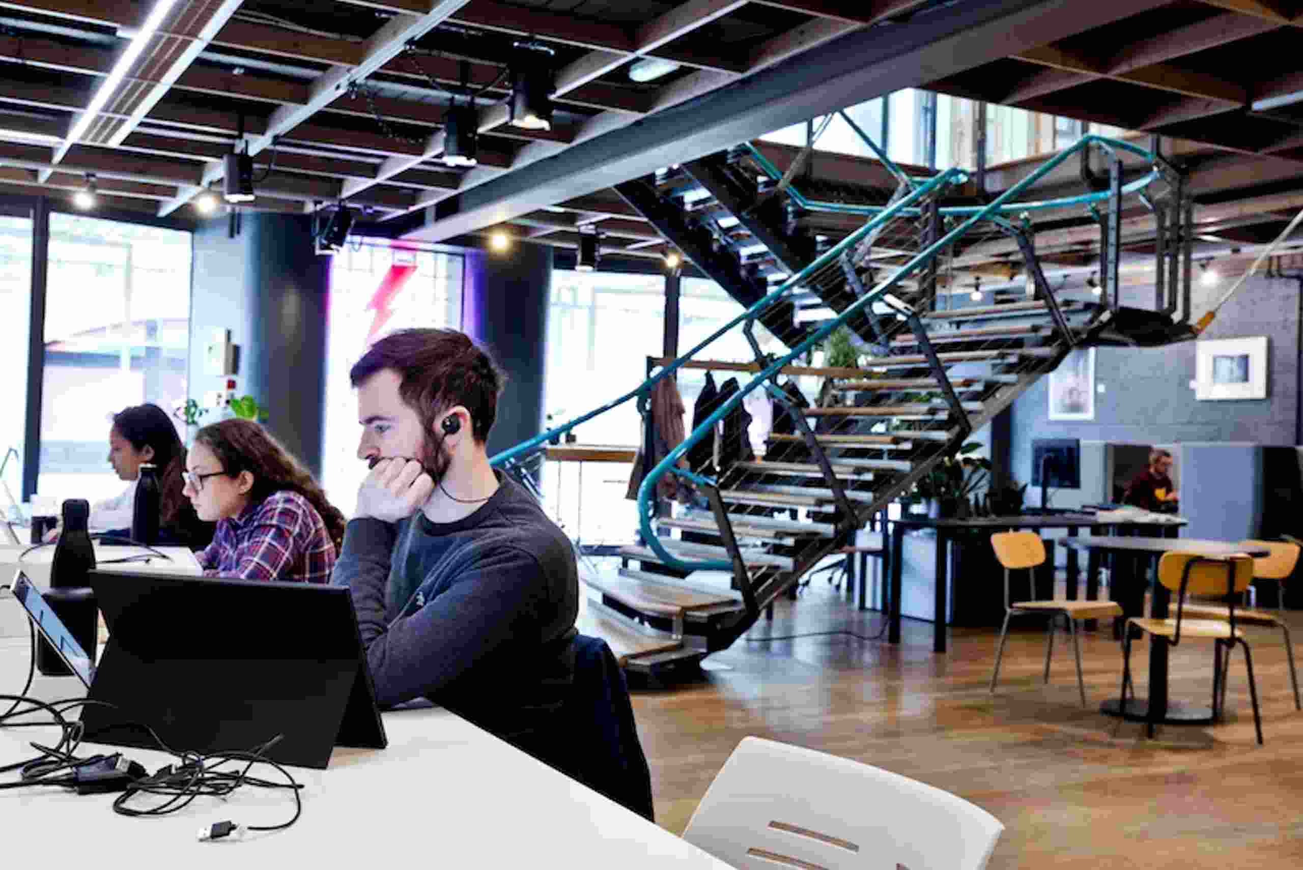 Hotel coworking lounge for remote professionals on a workcation