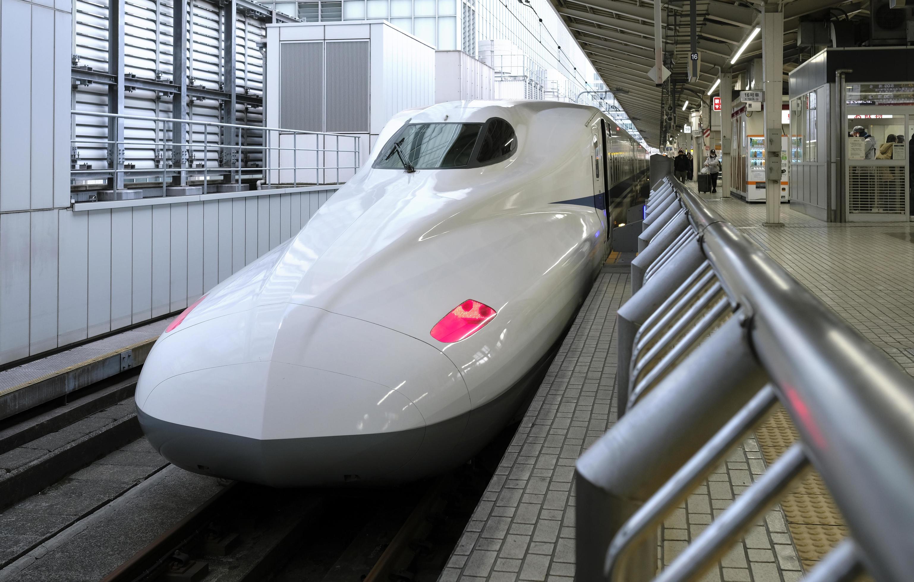 Japanese Shinkansen high-speed train at a station