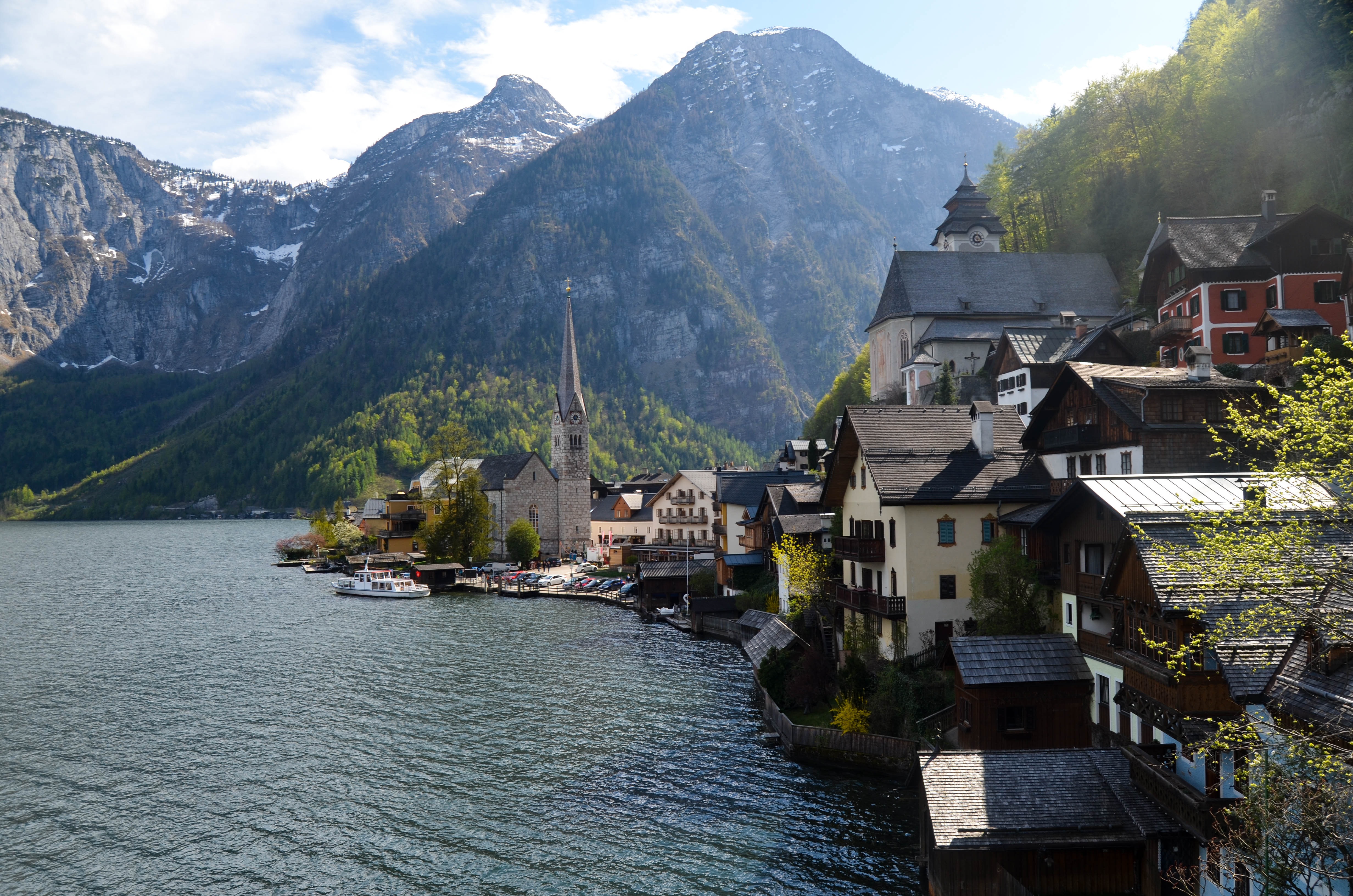Scenic mountain town surrounded by green summer peaks