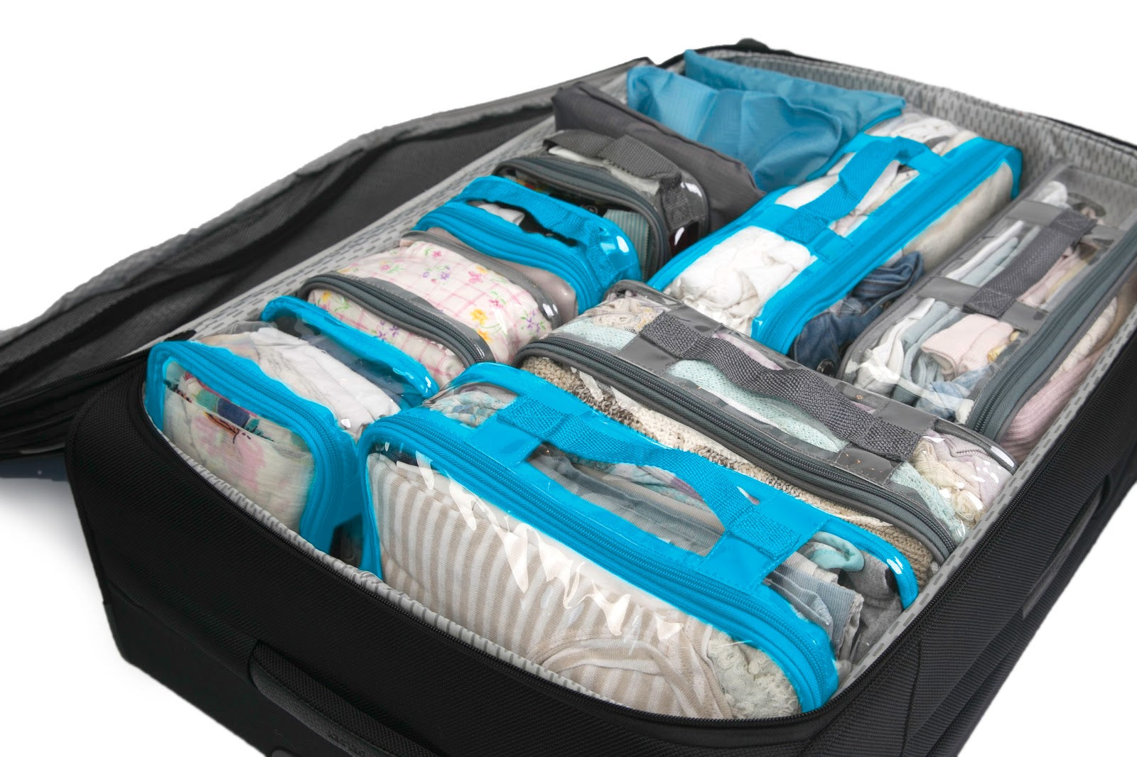 Packing cubes organizing clothes inside carry-on luggage