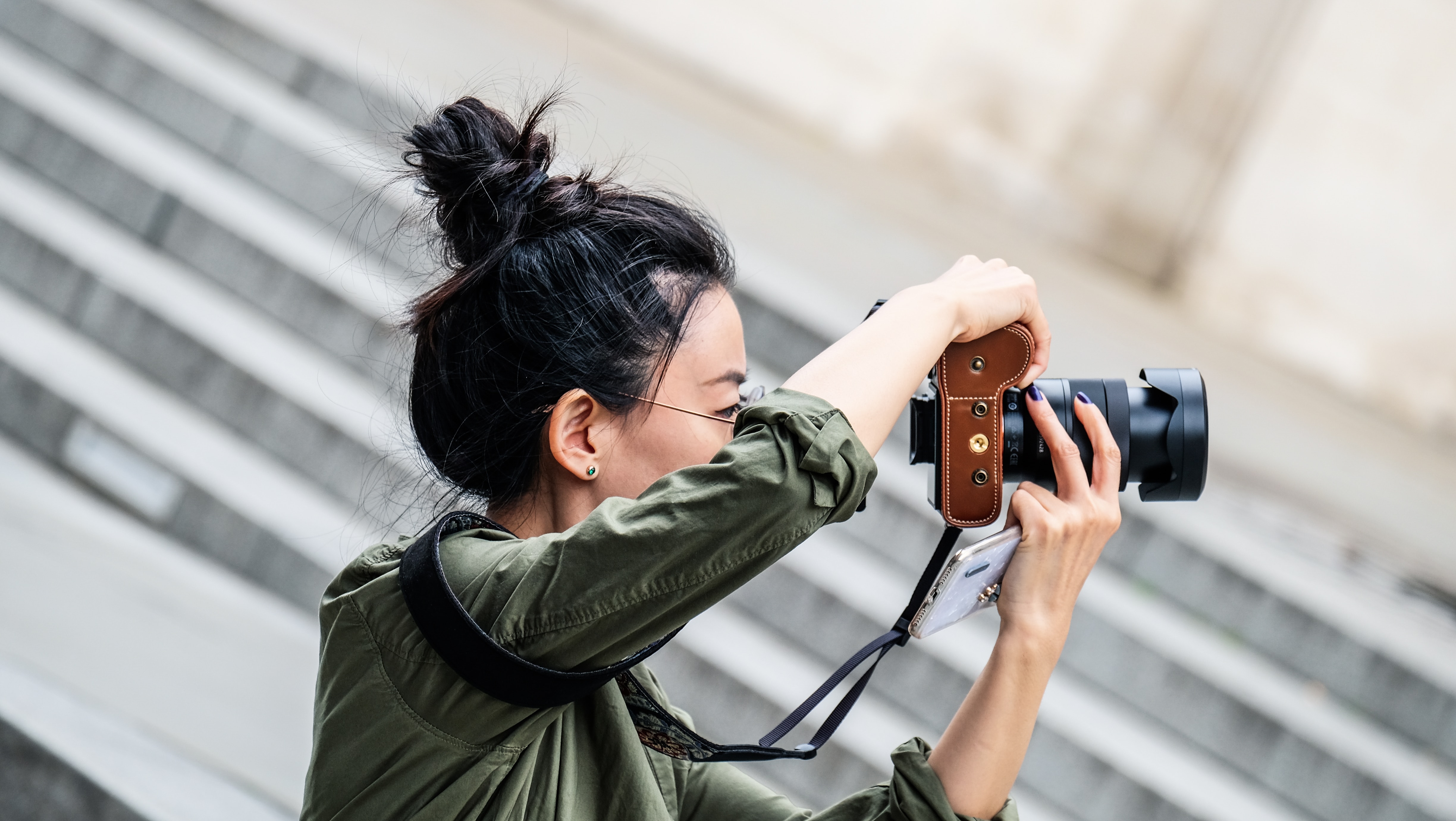 Travel photographer seeking permission before taking a portrait