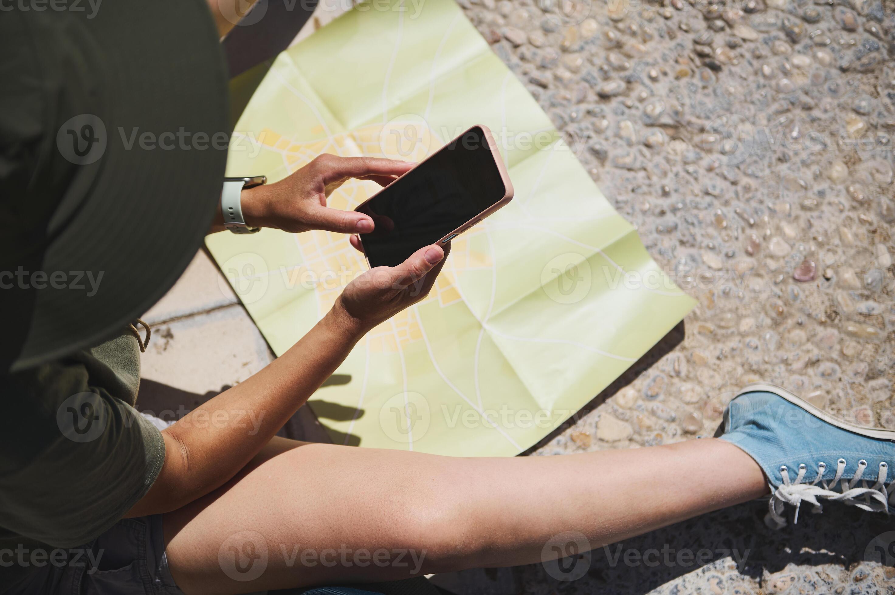 Traveler using an offline map during a self-guided city walk