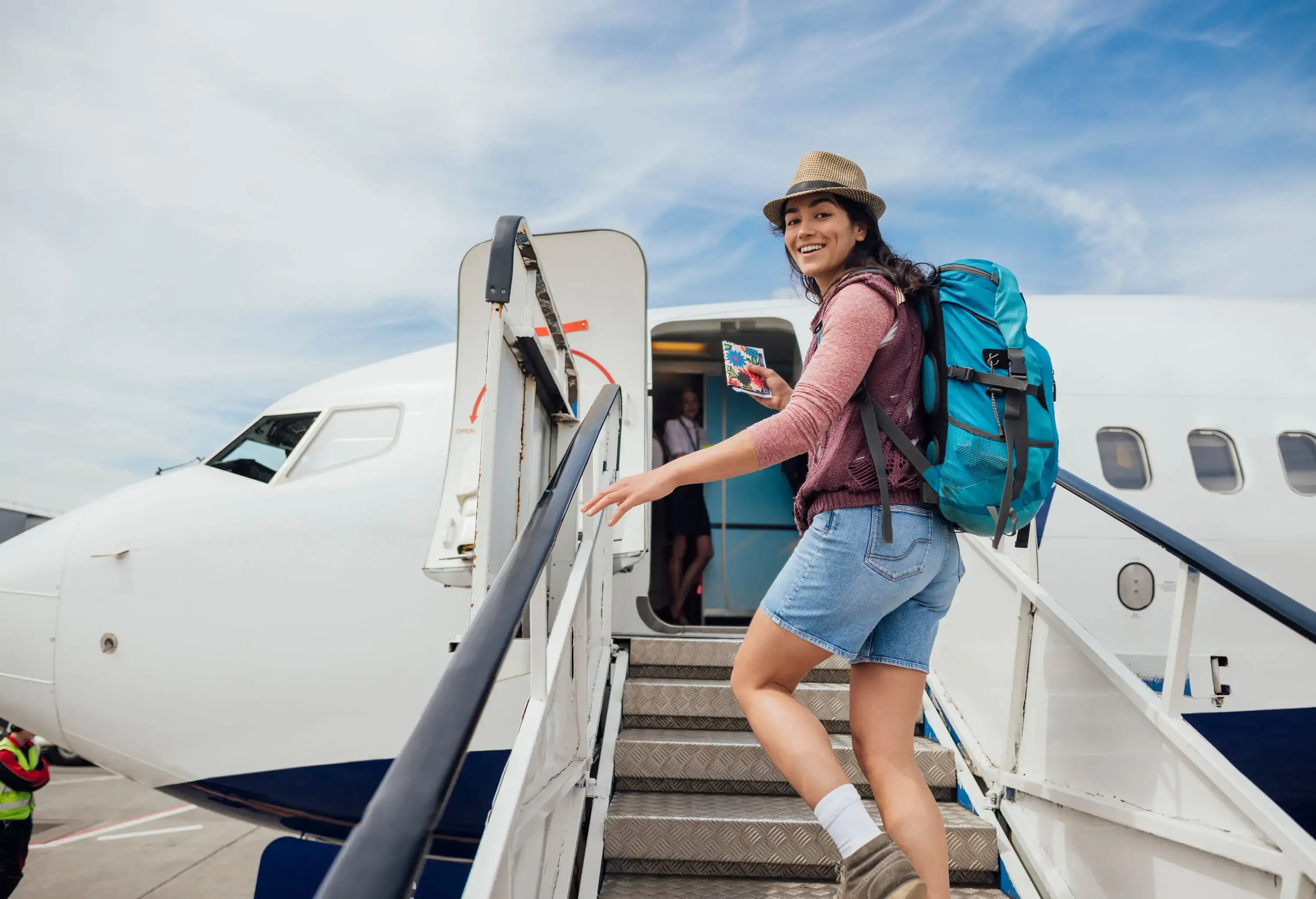 Traveler moving and stretching during a long-haul journey